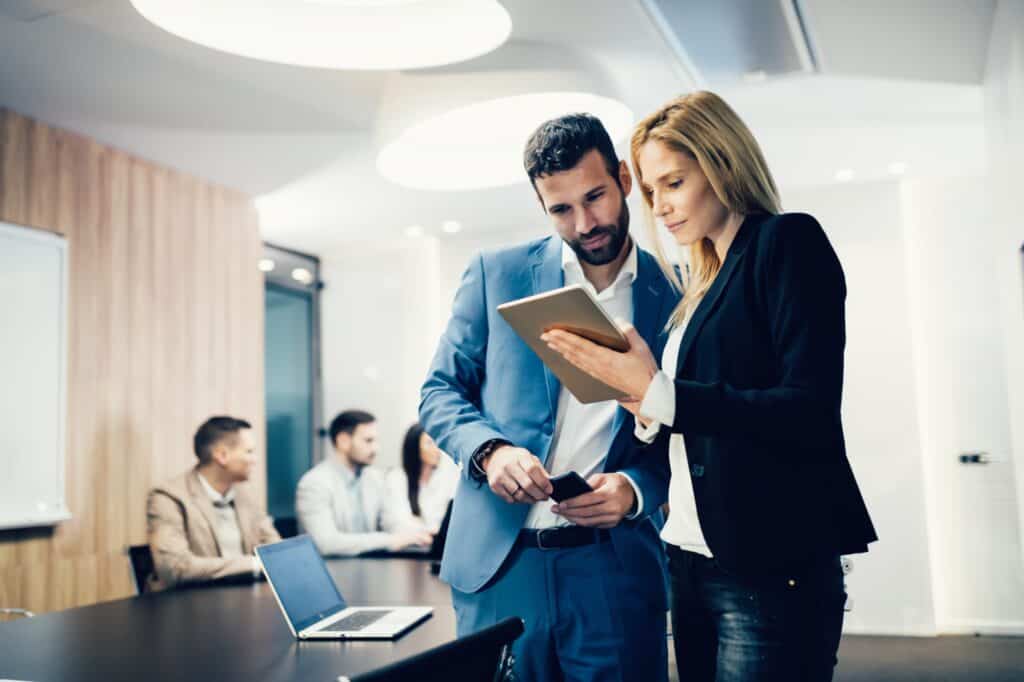 Business colleagues having meeting in conference room in modern office