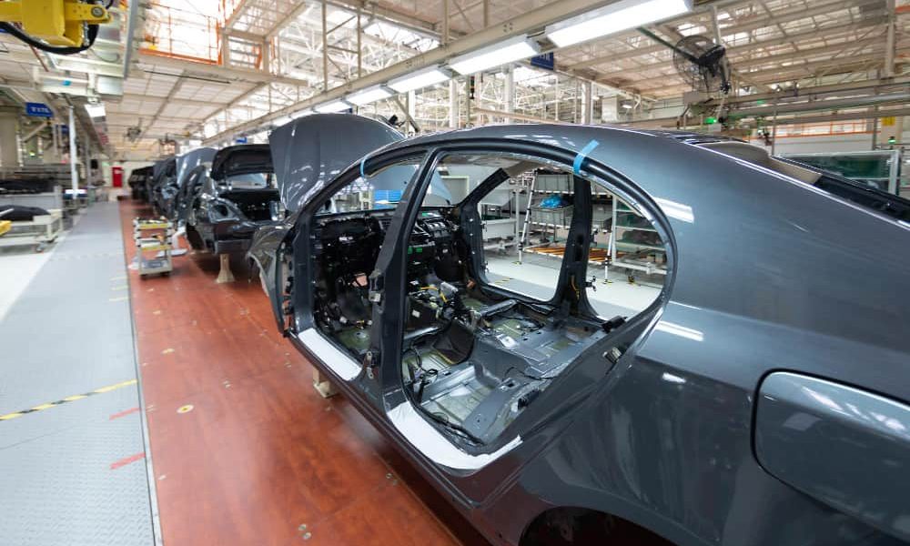 add-details-car-body-robotic-equipment-makes-assembly-car-modern-car-assembly-factory