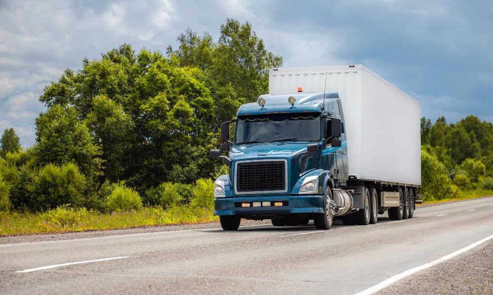 blue-truck-road-summer