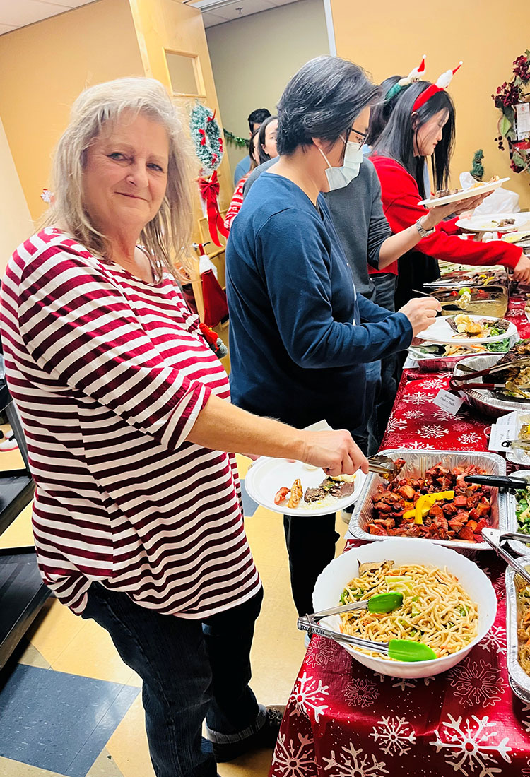 Head Office Potluck - Universal Logistics Universal & YOU Internal Newsletter - January 2026