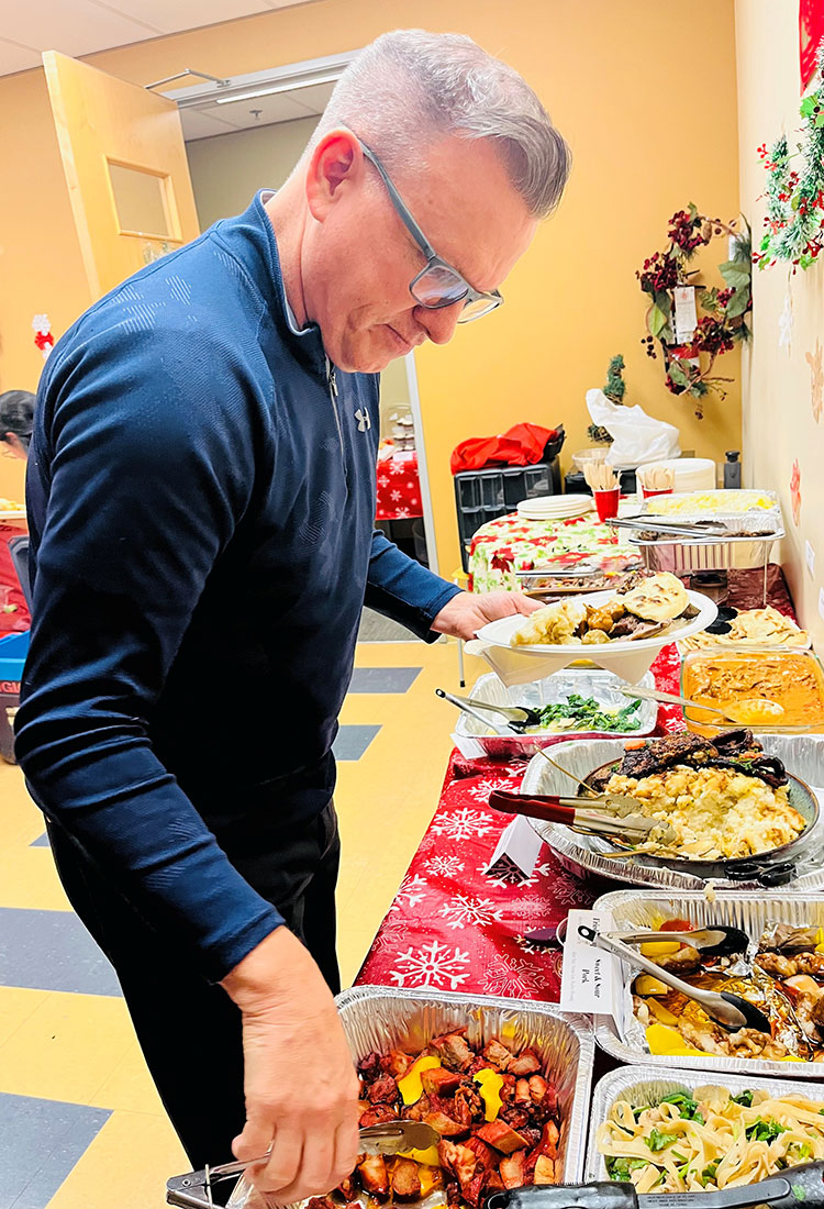 Head Office Potluck - Universal Logistics Universal & YOU Internal Newsletter - January 2026